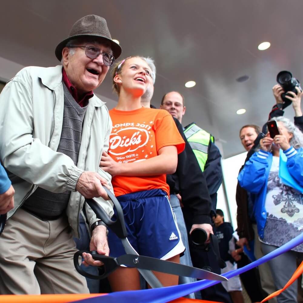 Dick Spady and Danielle Scamehorn at the Edmonds Grand Opening ribbon cutting